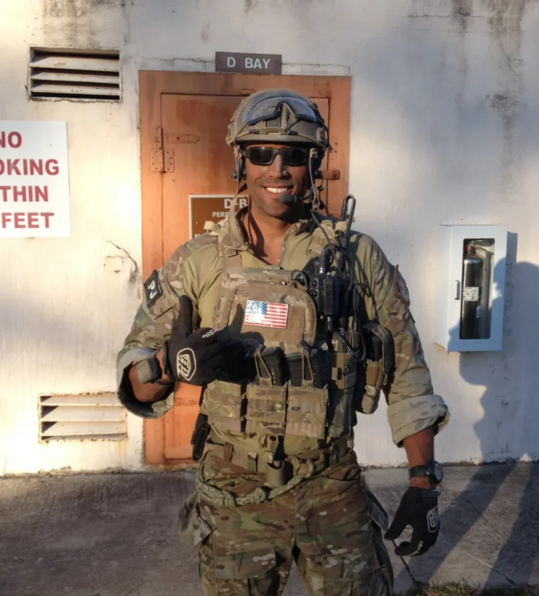 American soldier in gear with thumbs up